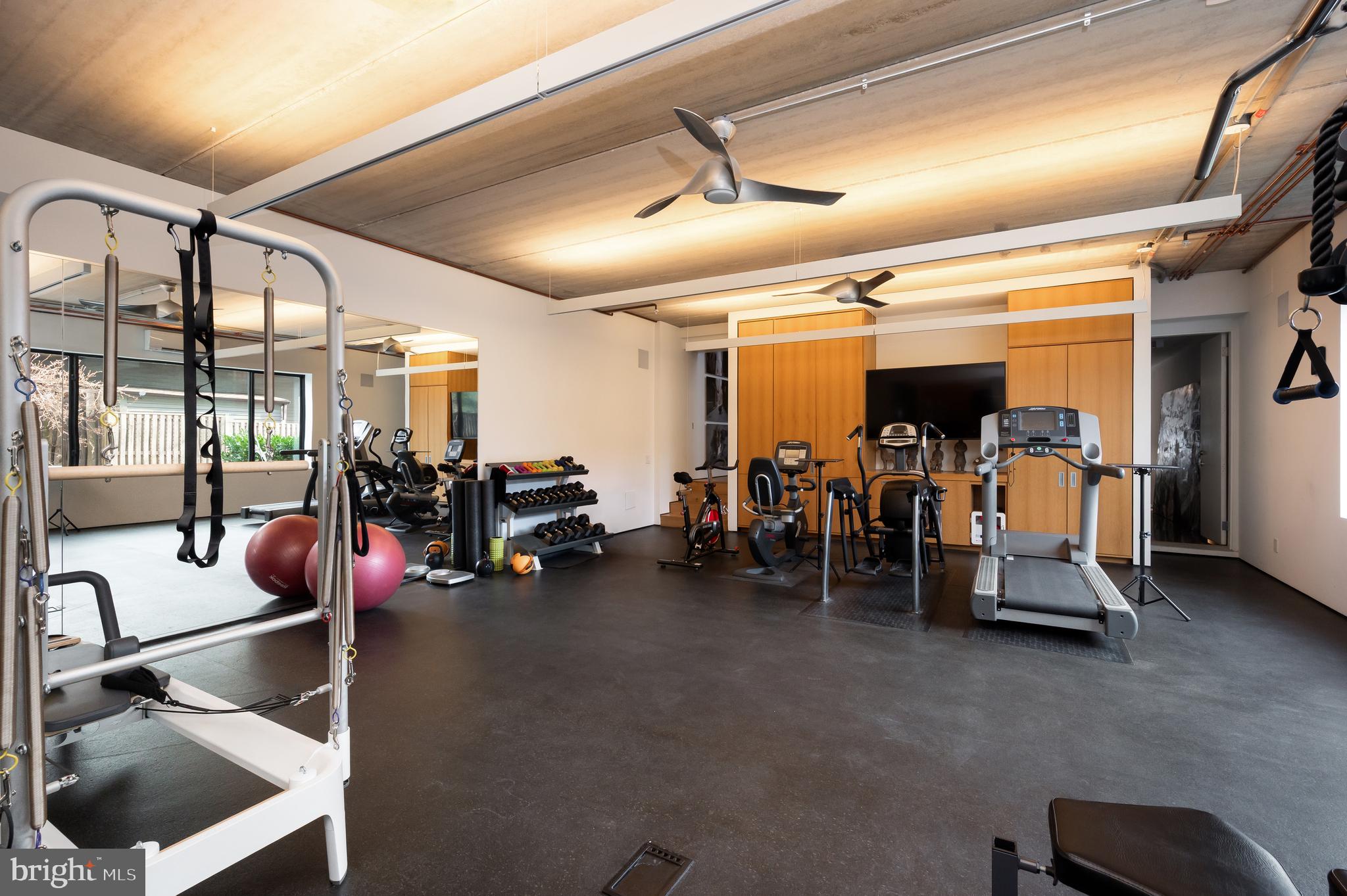 5124 Wissioming Road Bethesda, MD 20816 - Photo 37 of 49 a view of a room with gym equipment