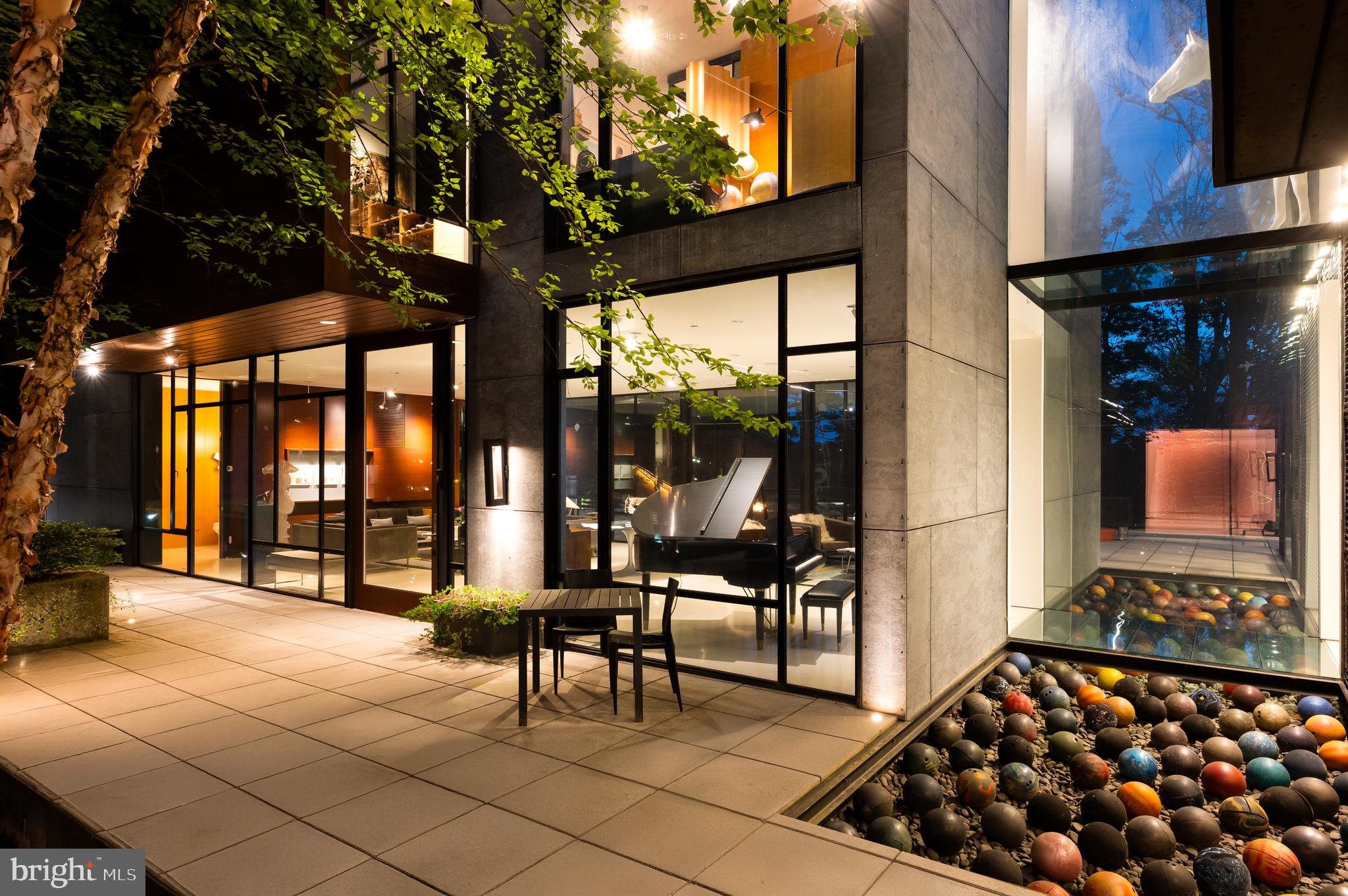 5124 Wissioming Road Bethesda, MD 20816 - Photo 46 of 49 a building outdoor space with glass windows and furniture