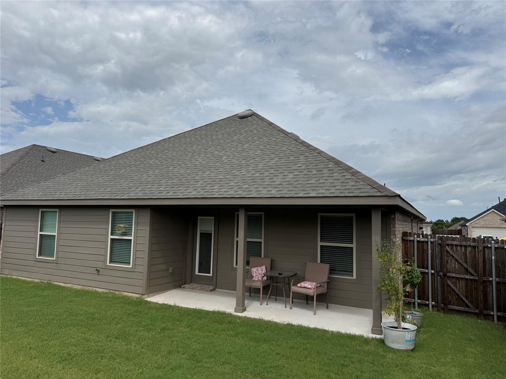 1602 Maple Ridge Drive Princeton, TX 75407 - Photo 13 of 13 Covered patio with concrete flooring, shingle roof, and durable siding