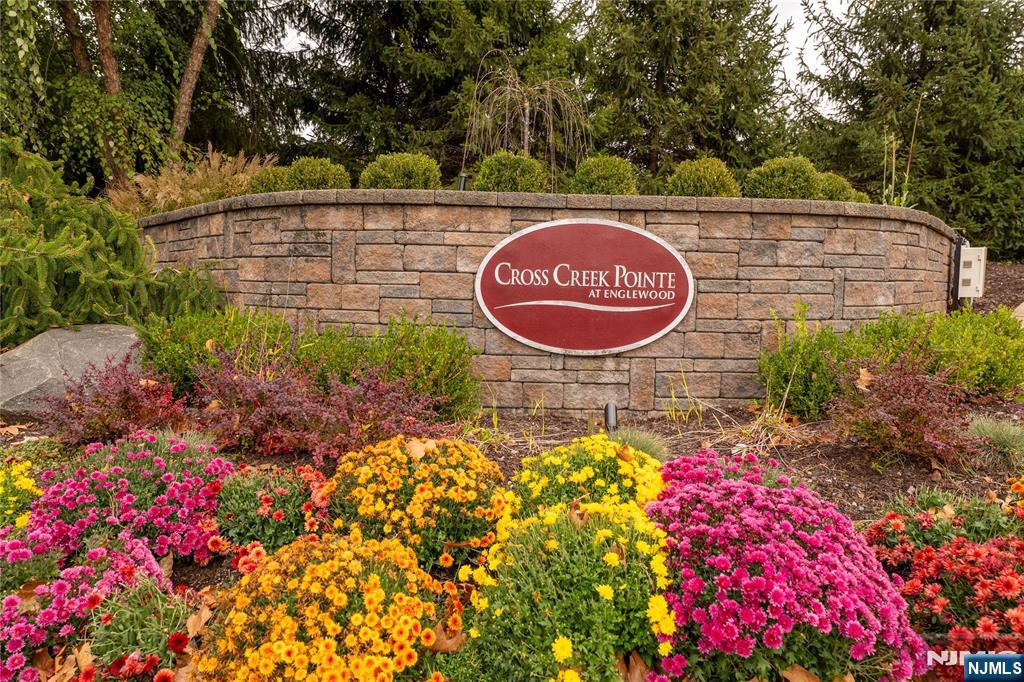 56 Fox Run Drive, Unit 56 Englewood, NJ 07631 - Photo 1 of 31 a view of a bunch of flowers and trees