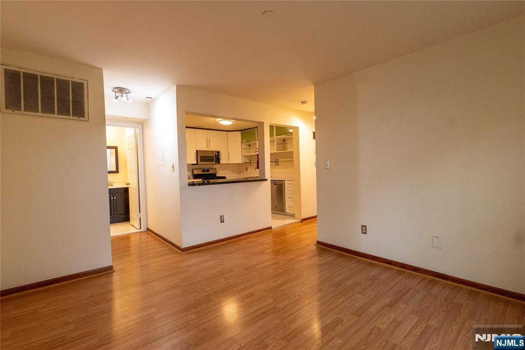 56 Fox Run Drive, Unit 56 Englewood, NJ 07631 - Photo 10 of 31 a view of a kitchen with a stove top oven
