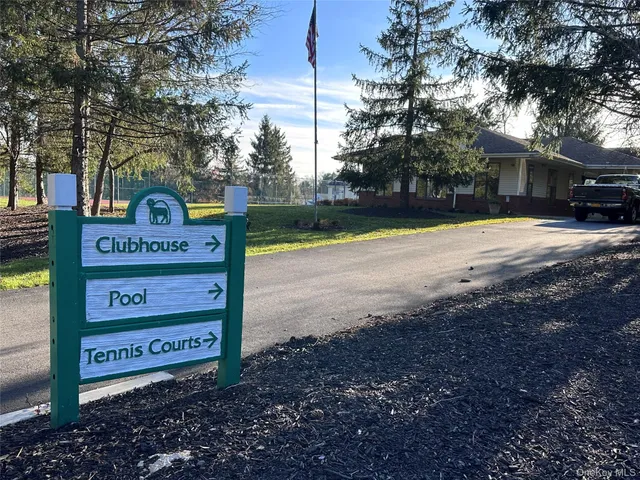 a view of outdoor space with sign board