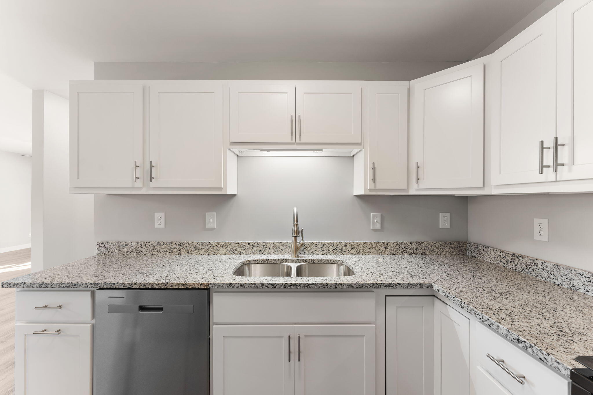 191 Mallard Pointe Drive Valparaiso, IN 46385 - Photo 12 of 25 a kitchen with granite countertop white cabinets and a sink