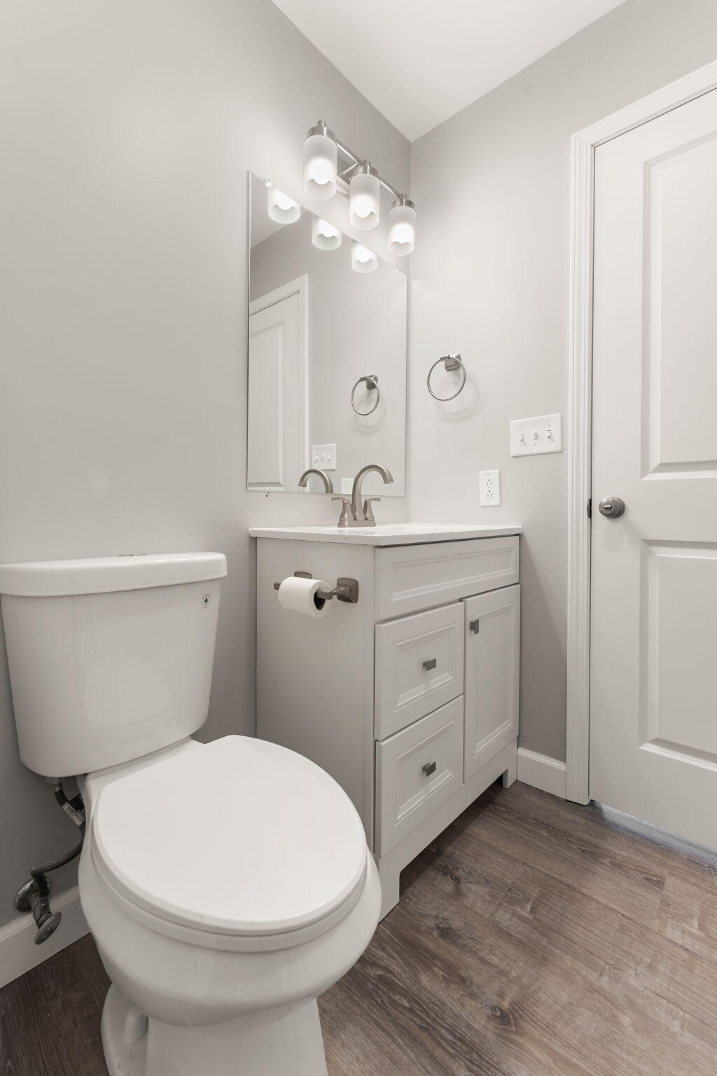 191 Mallard Pointe Drive Valparaiso, IN 46385 - Photo 18 of 25 a bathroom with a toilet a sink and mirror