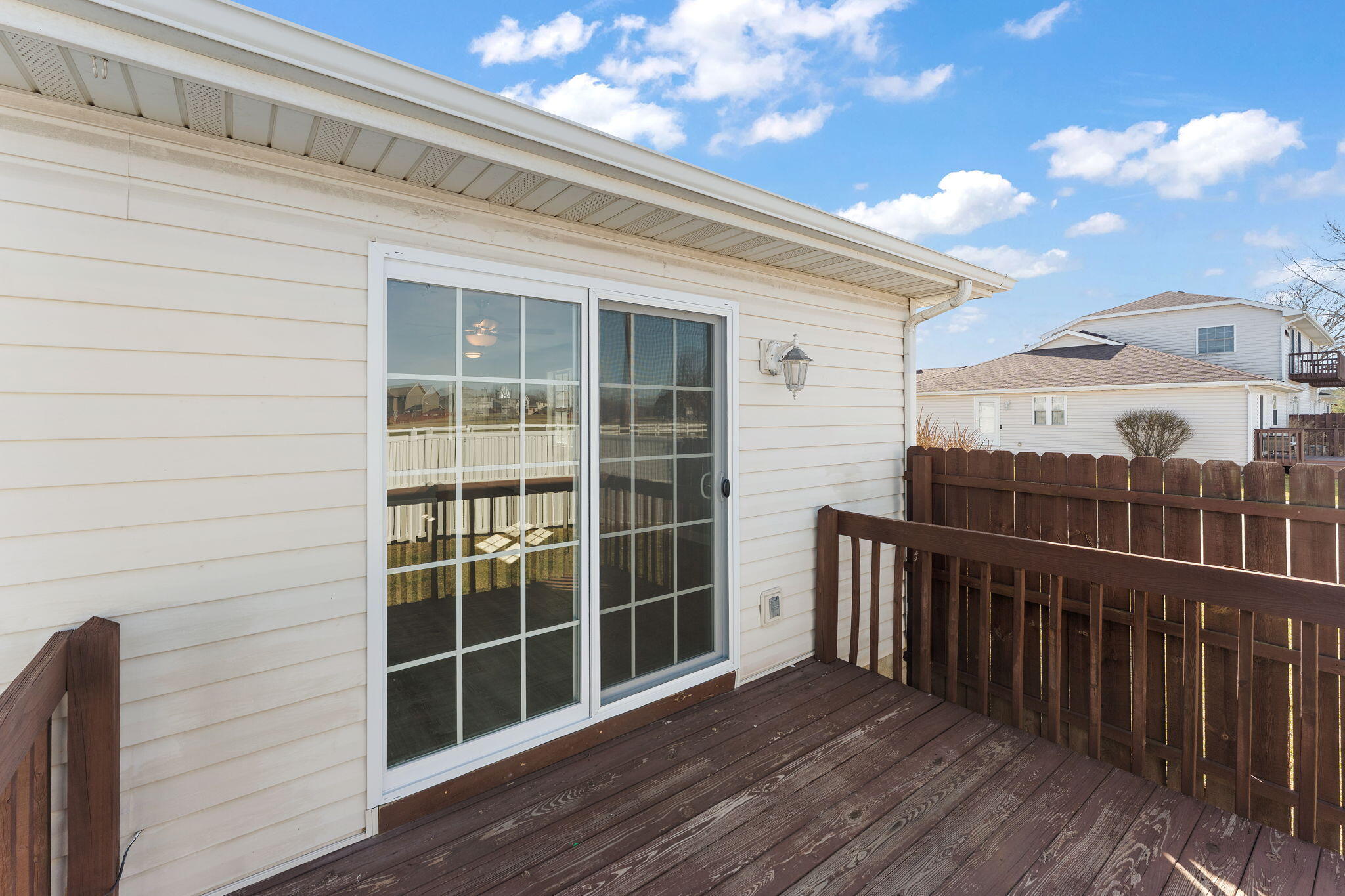 191 Mallard Pointe Drive Valparaiso, IN 46385 - Photo 23 of 25 a view of a balcony with wooden floor and fence