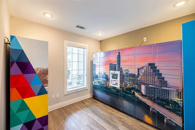 a view of a living room with a large window
