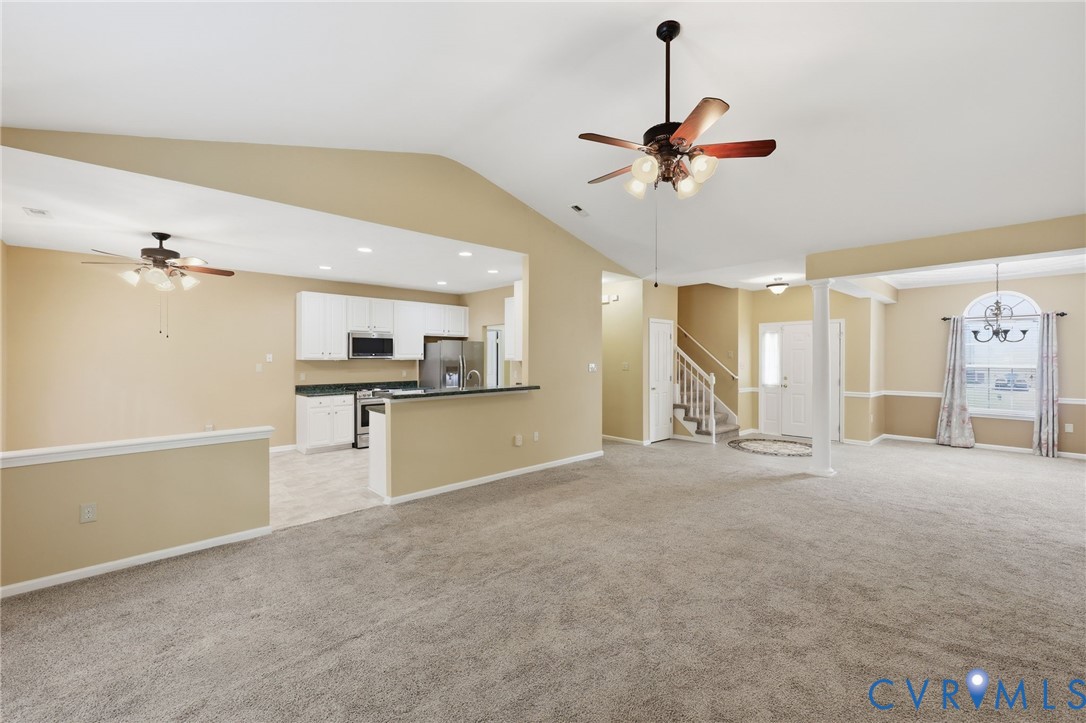 14719 Clover Ridge Lane Chesterfield, VA 23832 - Photo 7 of 36 Open concept living space featuring vaulted ceilin
