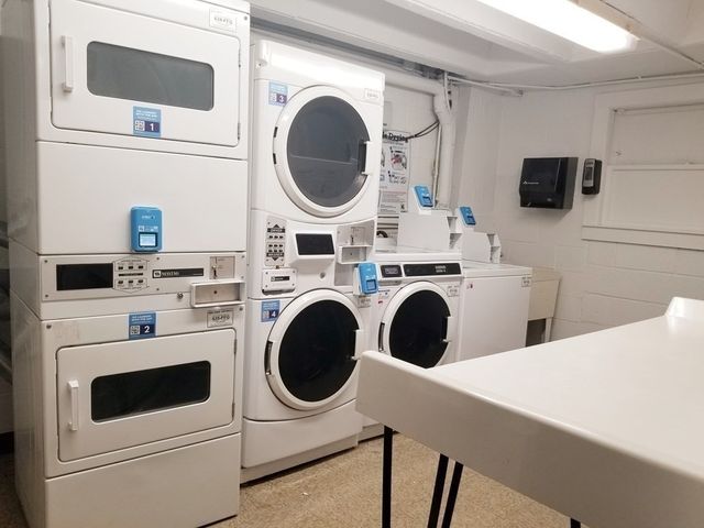 a view of kitchen with washer and dryer