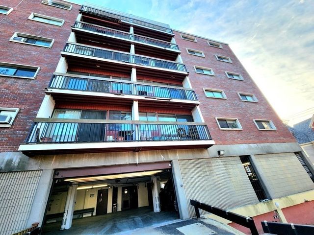 a view of a building from a balcony