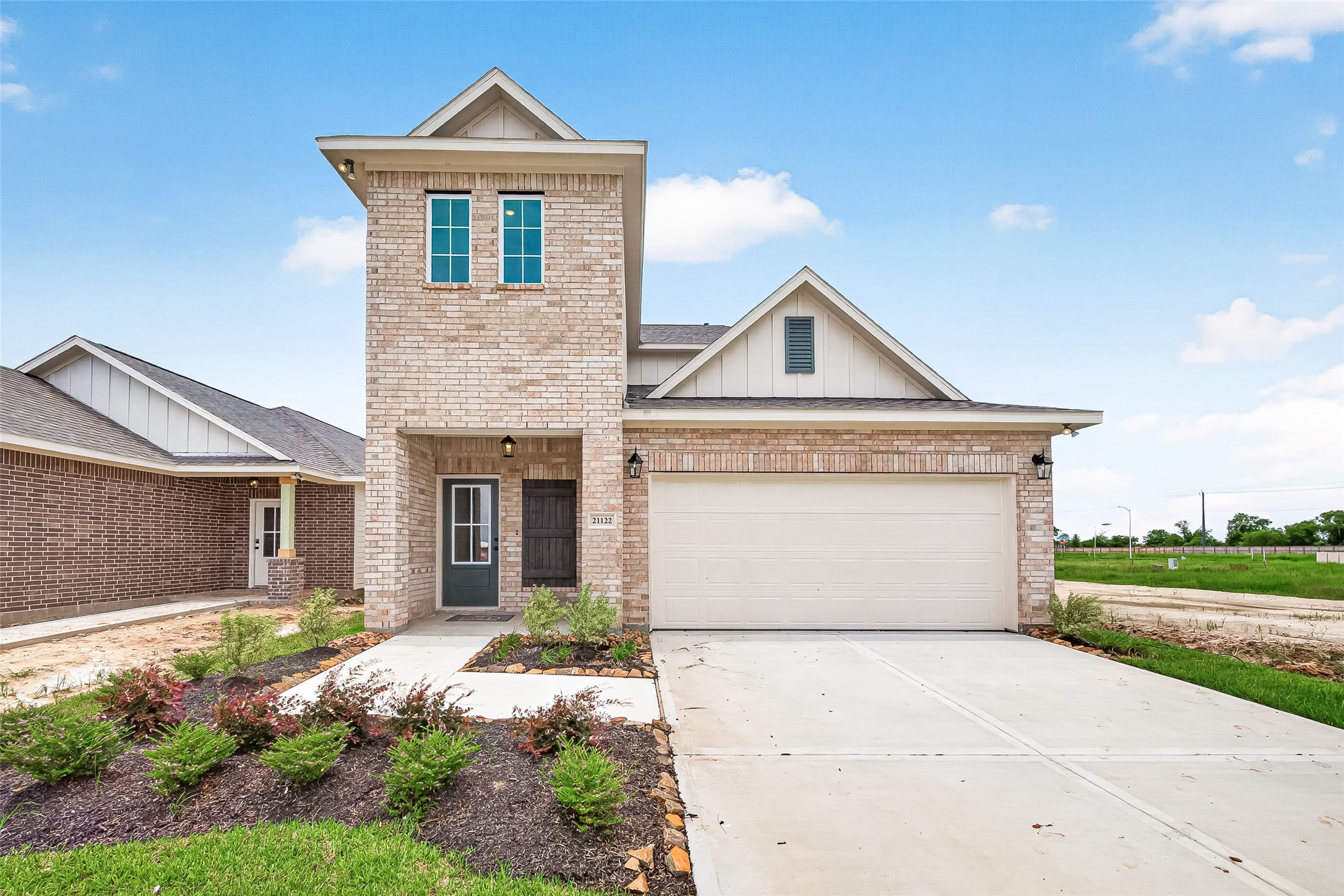 21122 Autumn Heights Rosharon, TX 77583 - Photo 3 of 42 a front view of a house with a yard and garage