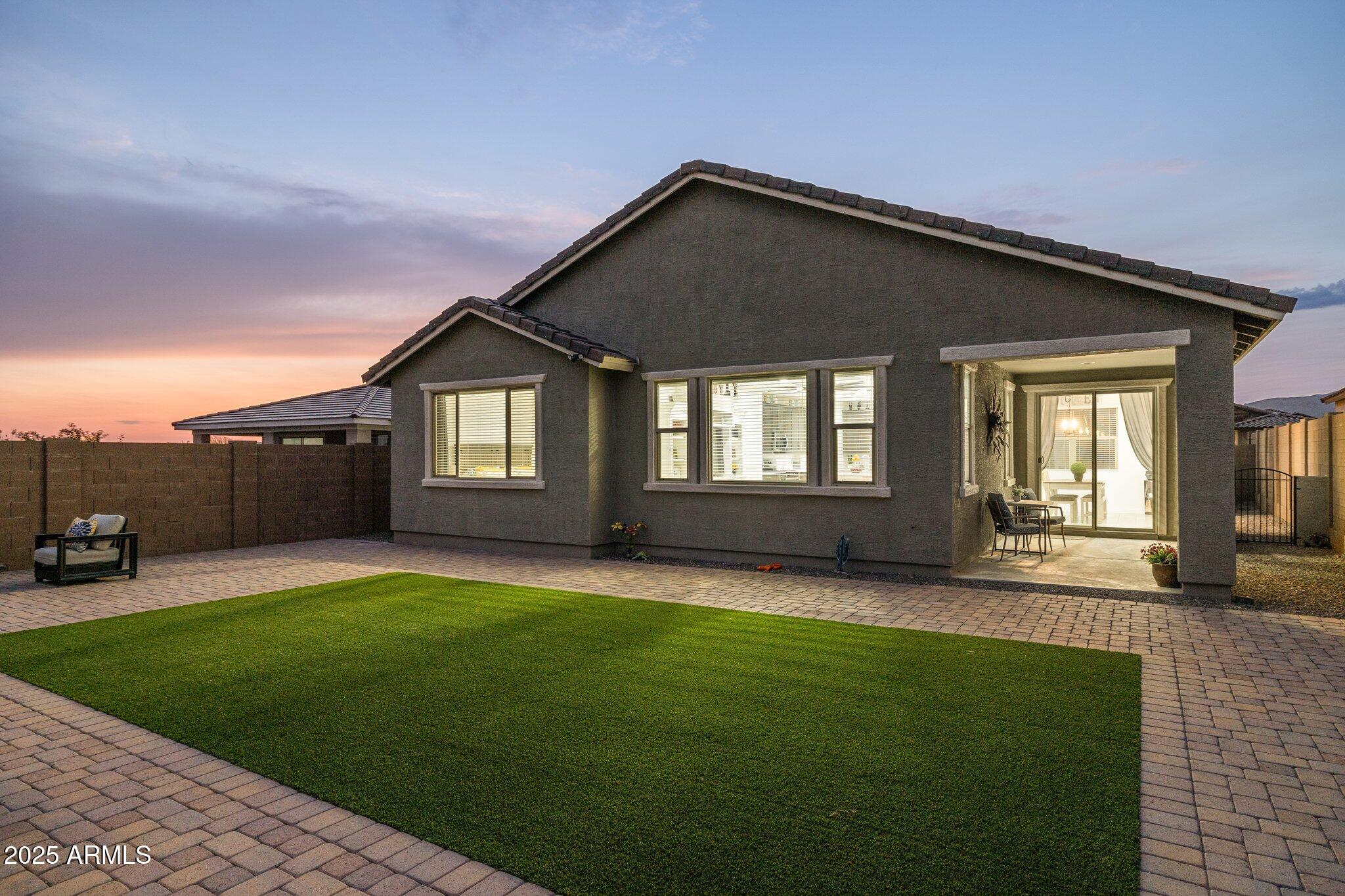 12347 East Soloman Road Gold Canyon, AZ 85118 - Photo 26 of 51 a front view of a house with a yard and trees