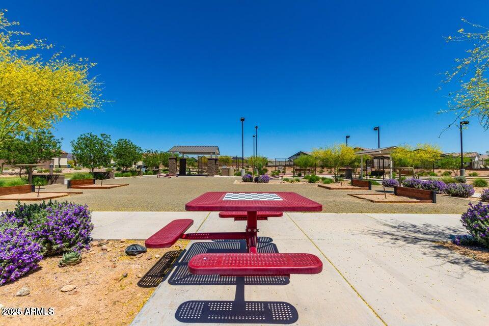 12347 East Soloman Road Gold Canyon, AZ 85118 - Photo 46 of 51 a swimming pool with outdoor seating and yard