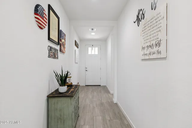 a view of a backyard with sitting area