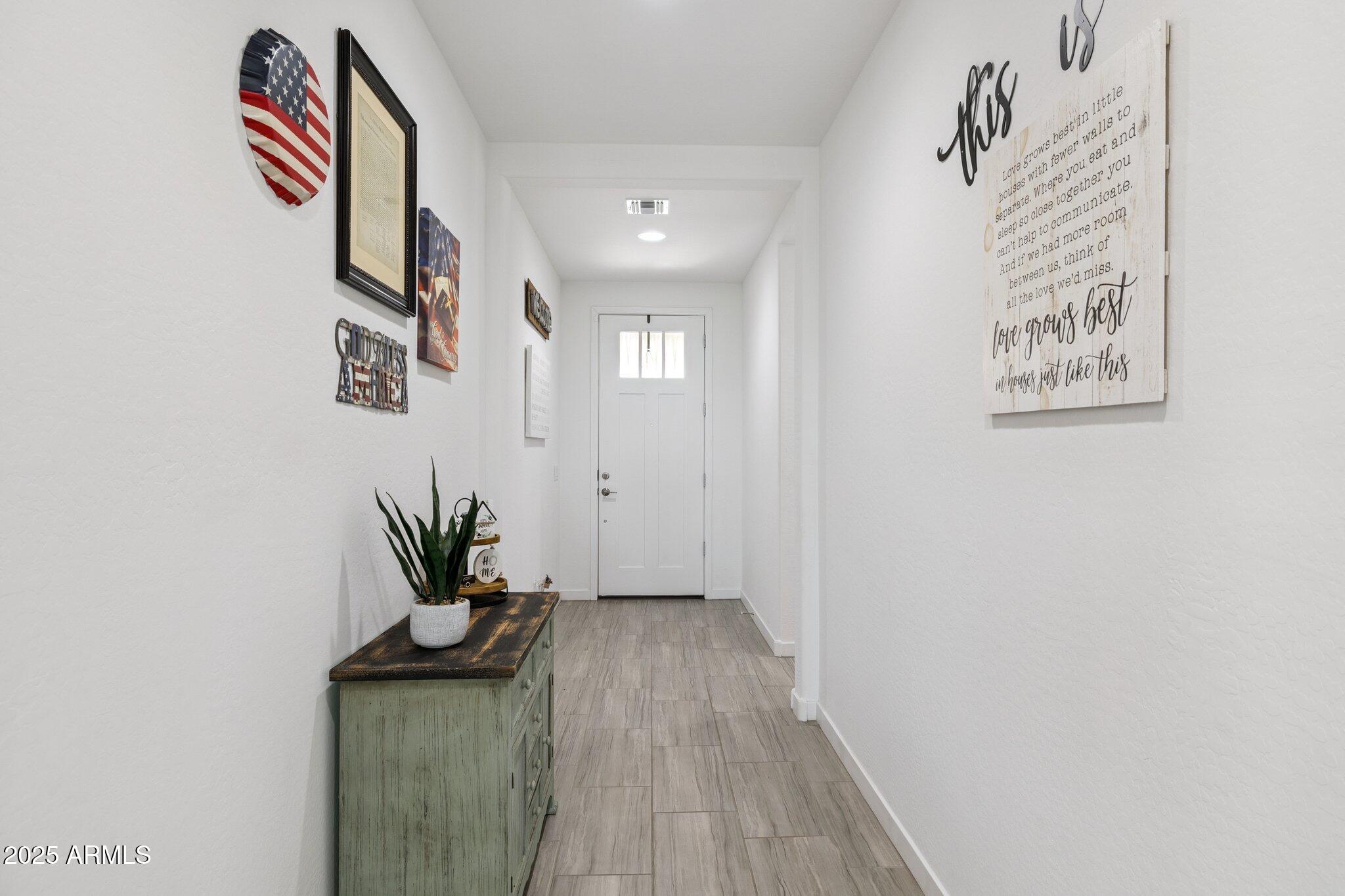 12347 East Soloman Road Gold Canyon, AZ 85118 - Photo 7 of 51 a view of entryway with wooden floor