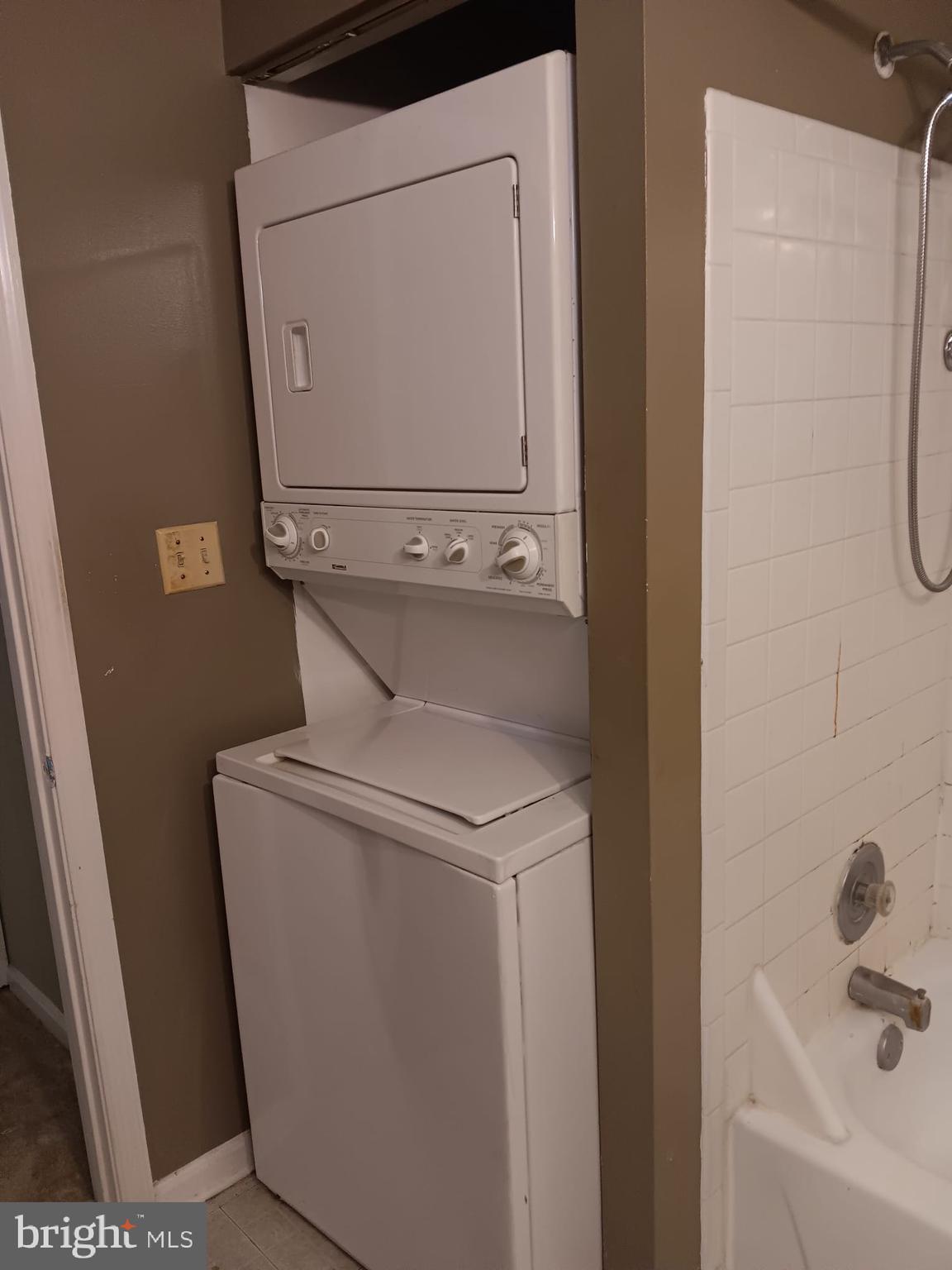 1647 Carriage House Terrace, Unit 1647C Silver Spring, MD 20904 - Photo 18 of 25 a utility room with dryer and washer