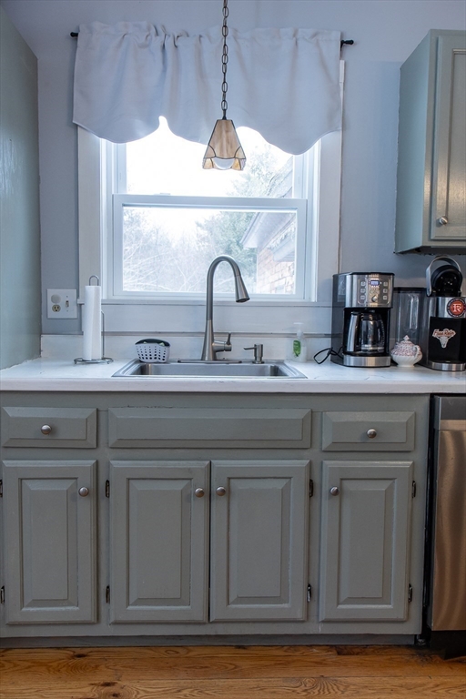 20 Paige Hill Road Brimfield, MA 01010 - Photo 17 of 40 a kitchen with granite countertop a sink and cabinets