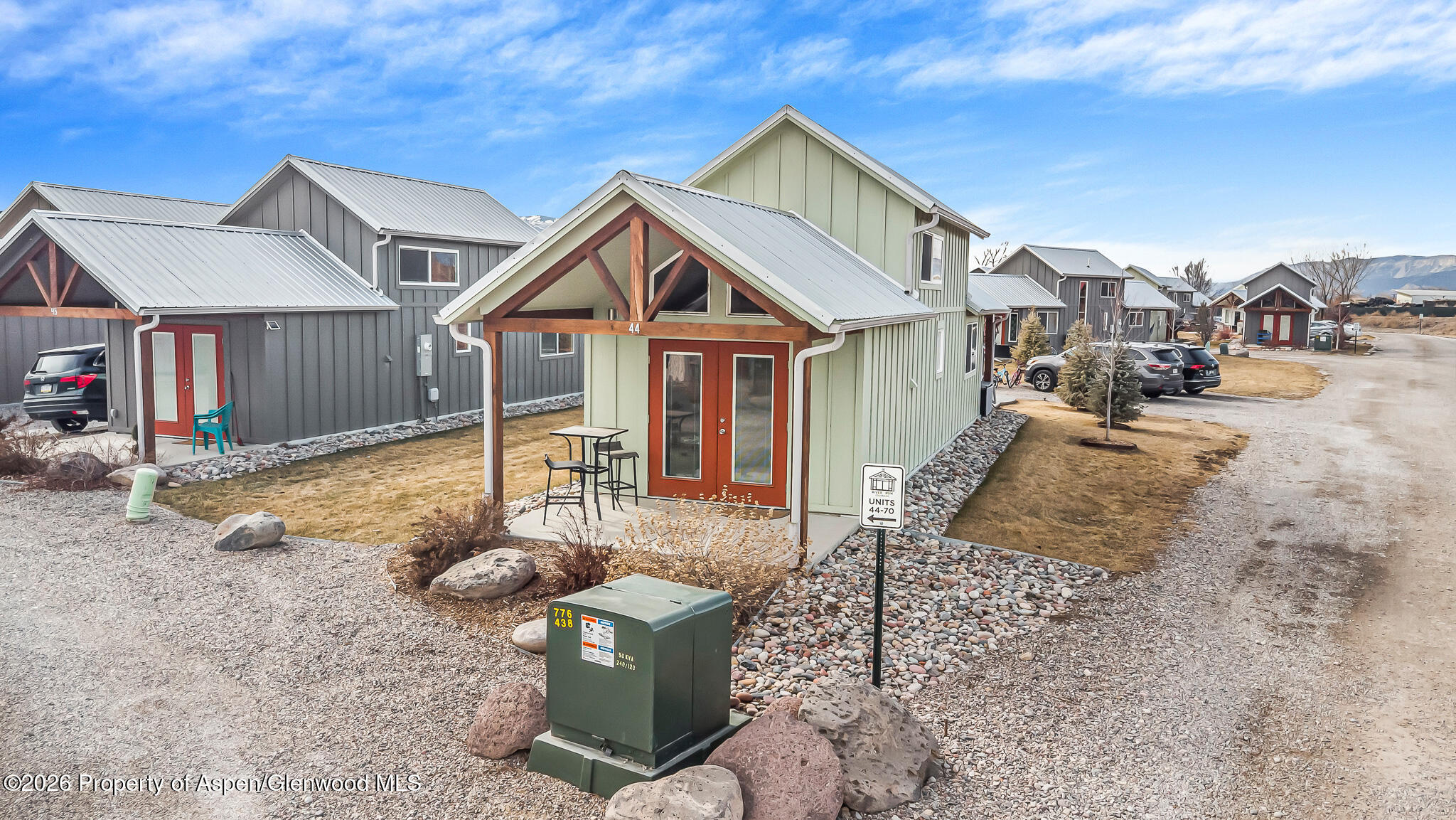 329 River Frontage Road, Unit 44 Silt, CO 81652 - Photo 14 of 17 a front view of a house with garden