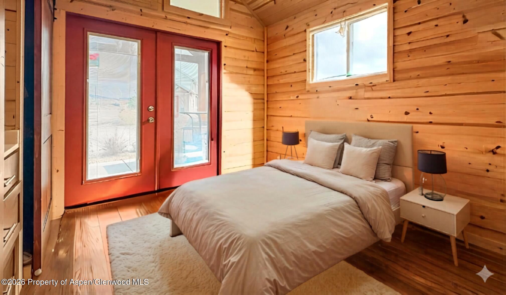 329 River Frontage Road, Unit 44 Silt, CO 81652 - Photo 6 of 17 a bedroom with a bed and a window