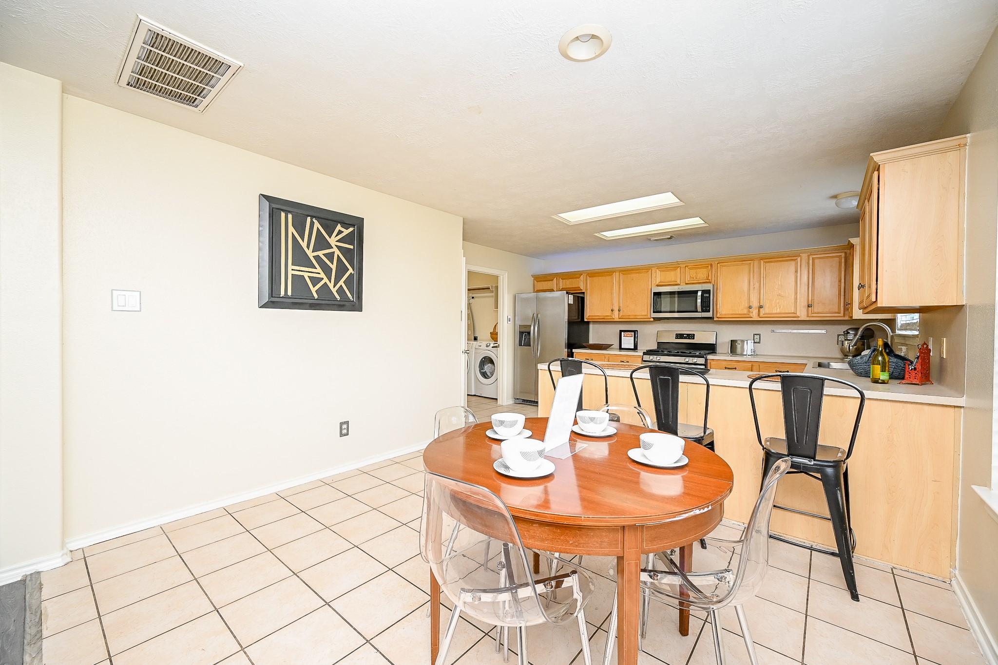 12122 Lucky Meadow Drive Tomball, TX 77375 - Photo 11 of 32 a view of a dining room with furniture