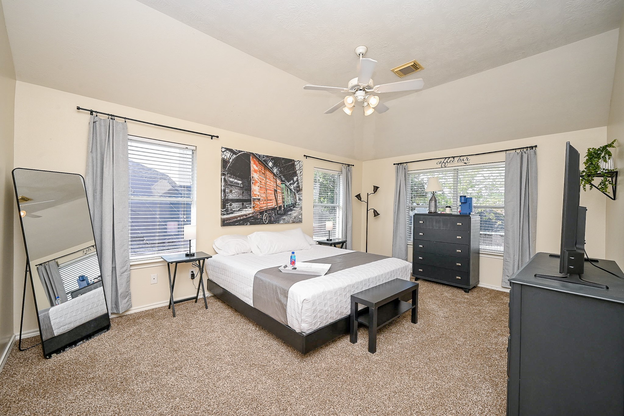 12122 Lucky Meadow Drive Tomball, TX 77375 - Photo 20 of 32 a living room with furniture and a flat screen tv
