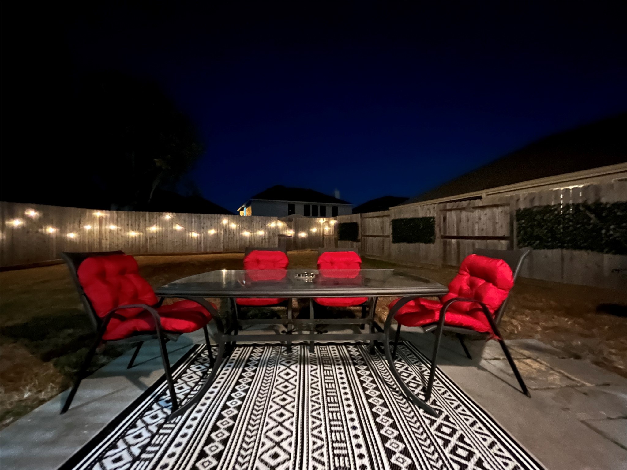 12122 Lucky Meadow Drive Tomball, TX 77375 - Photo 32 of 32 a view of a chairs and tables in patio