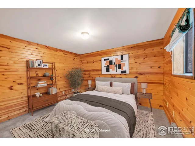 a view of bedroom with window