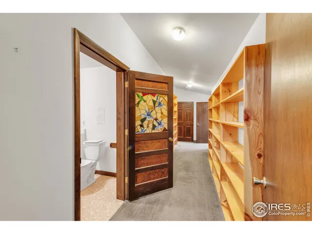 a room with furniture and white walls