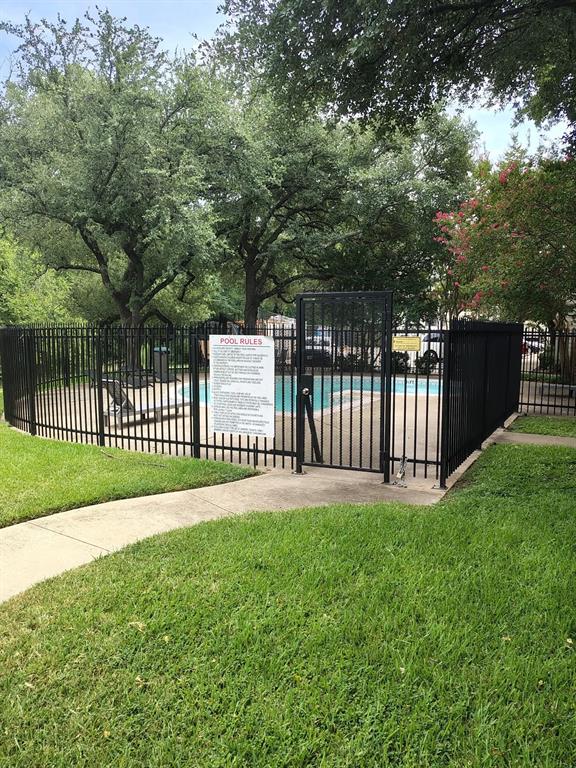 6900 Skillman Street, Unit 404 Dallas, TX 75231 - Photo 4 of 10 Community pool featuring a patio