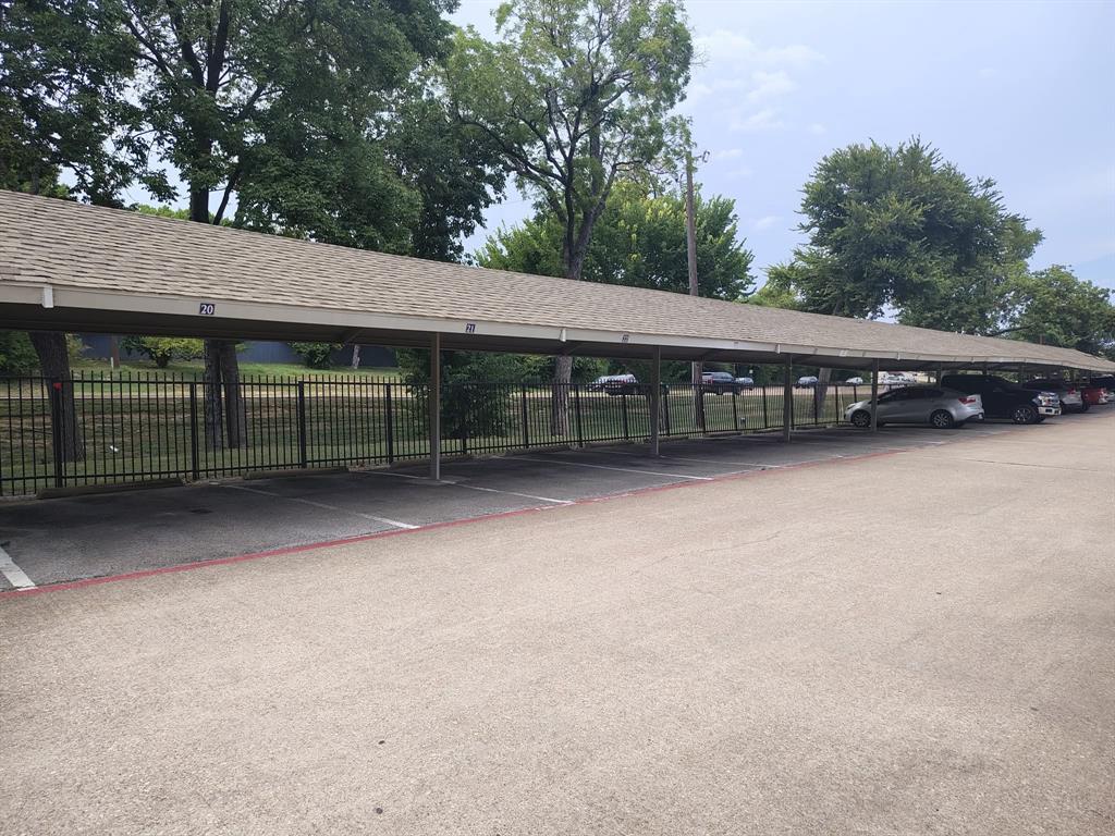 6900 Skillman Street, Unit 404 Dallas, TX 75231 - Photo 5 of 10 View of covered parking lot