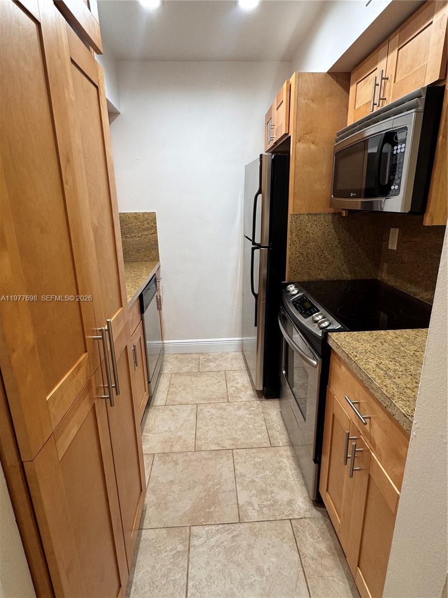 9392 Southwest 77th Avenue, Unit E5 Miami, FL 33156 - Photo 4 of 7