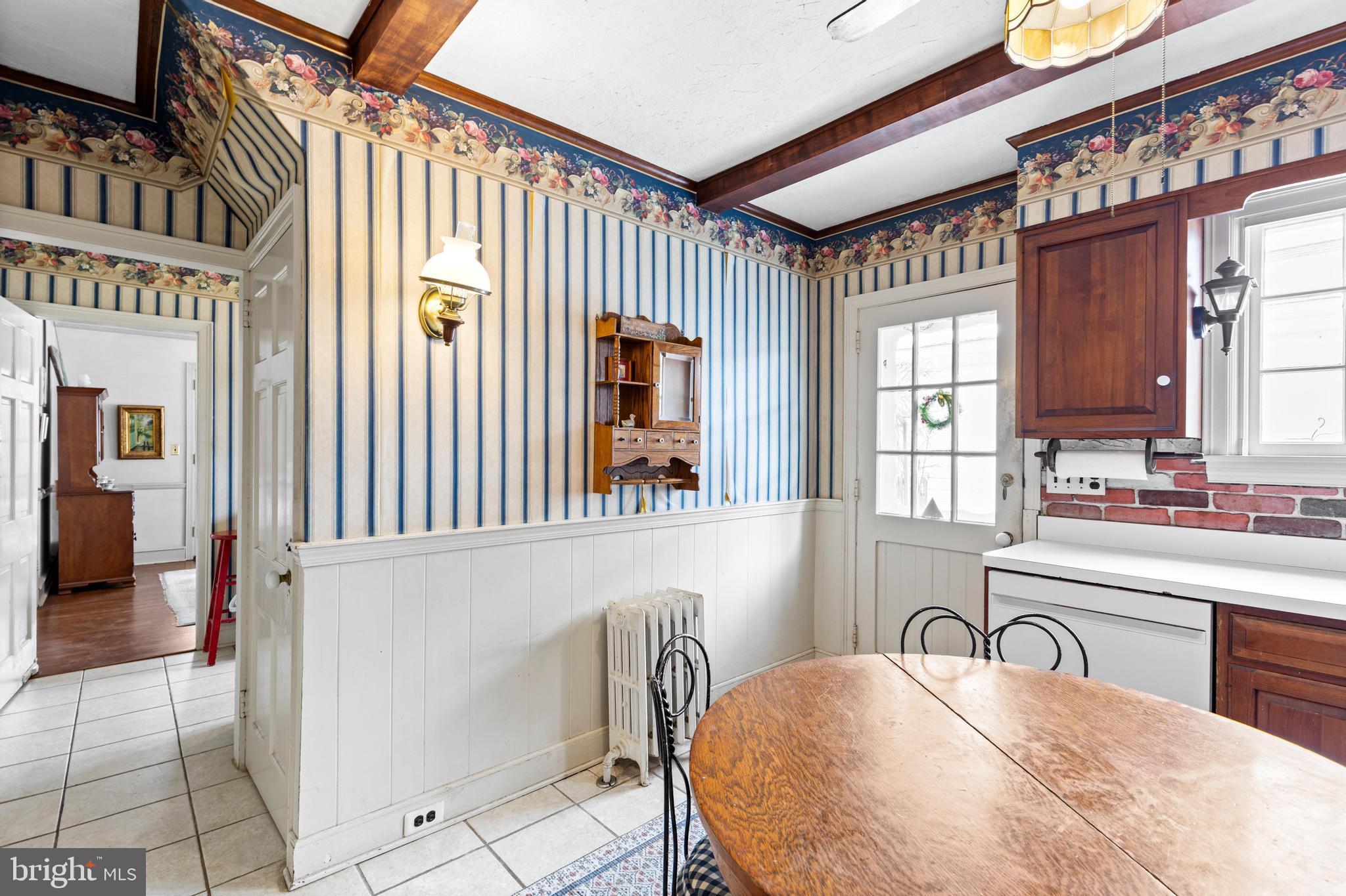 506 Spring Lane Wyndmoor, PA 19038 - Photo 14 of 29 a bathroom with a sink mirror and a bathtub