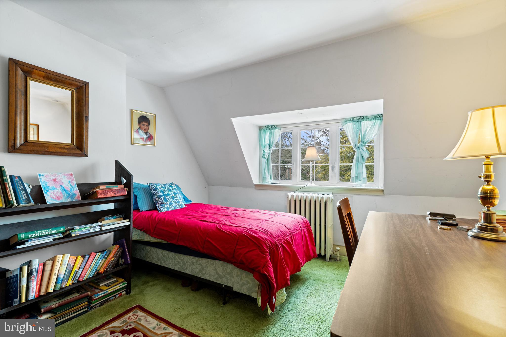 506 Spring Lane Wyndmoor, PA 19038 - Photo 23 of 29 a bedroom with a bed and a window