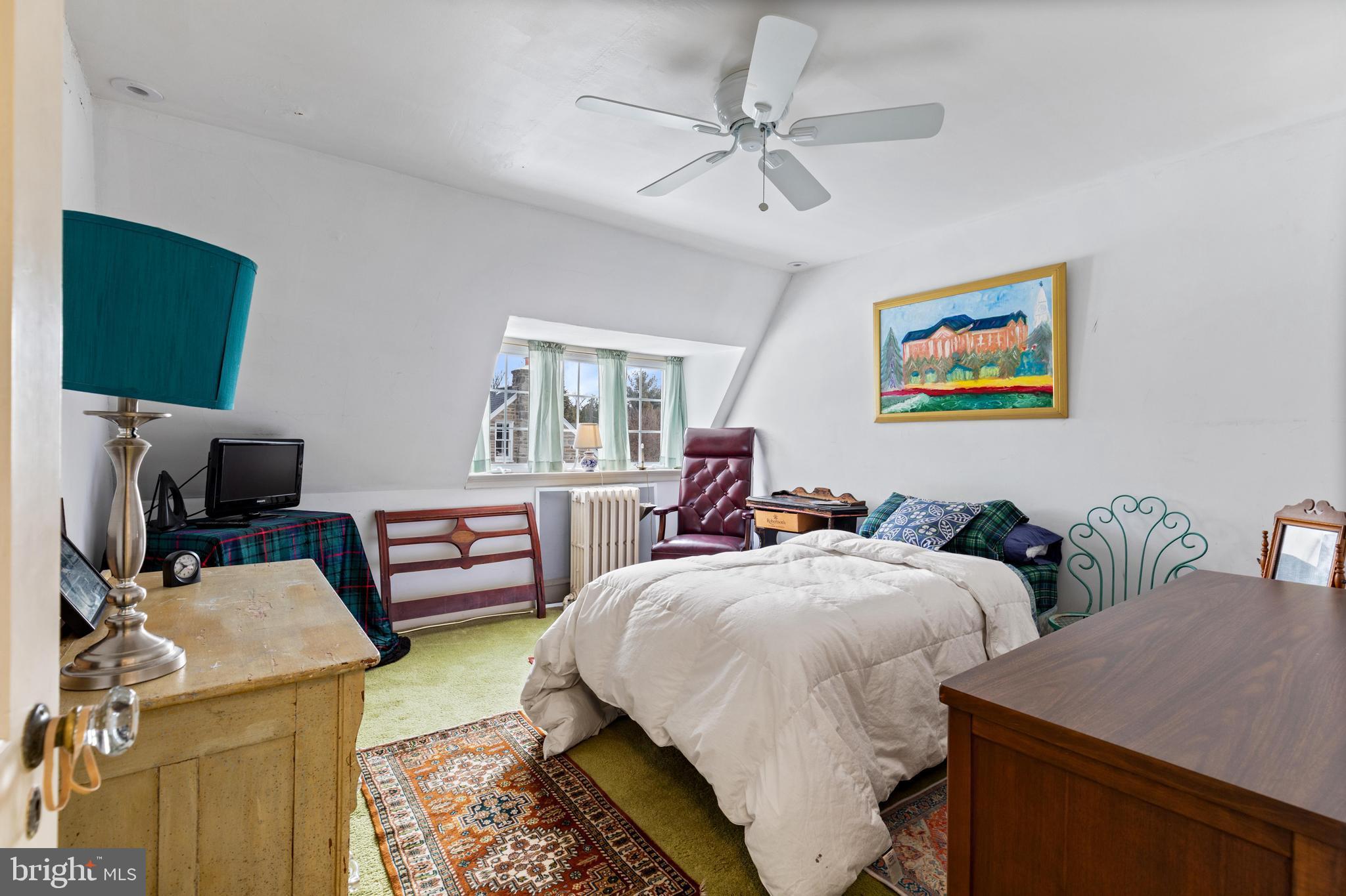 506 Spring Lane Wyndmoor, PA 19038 - Photo 24 of 29 a bedroom with two beds and a flat screen tv