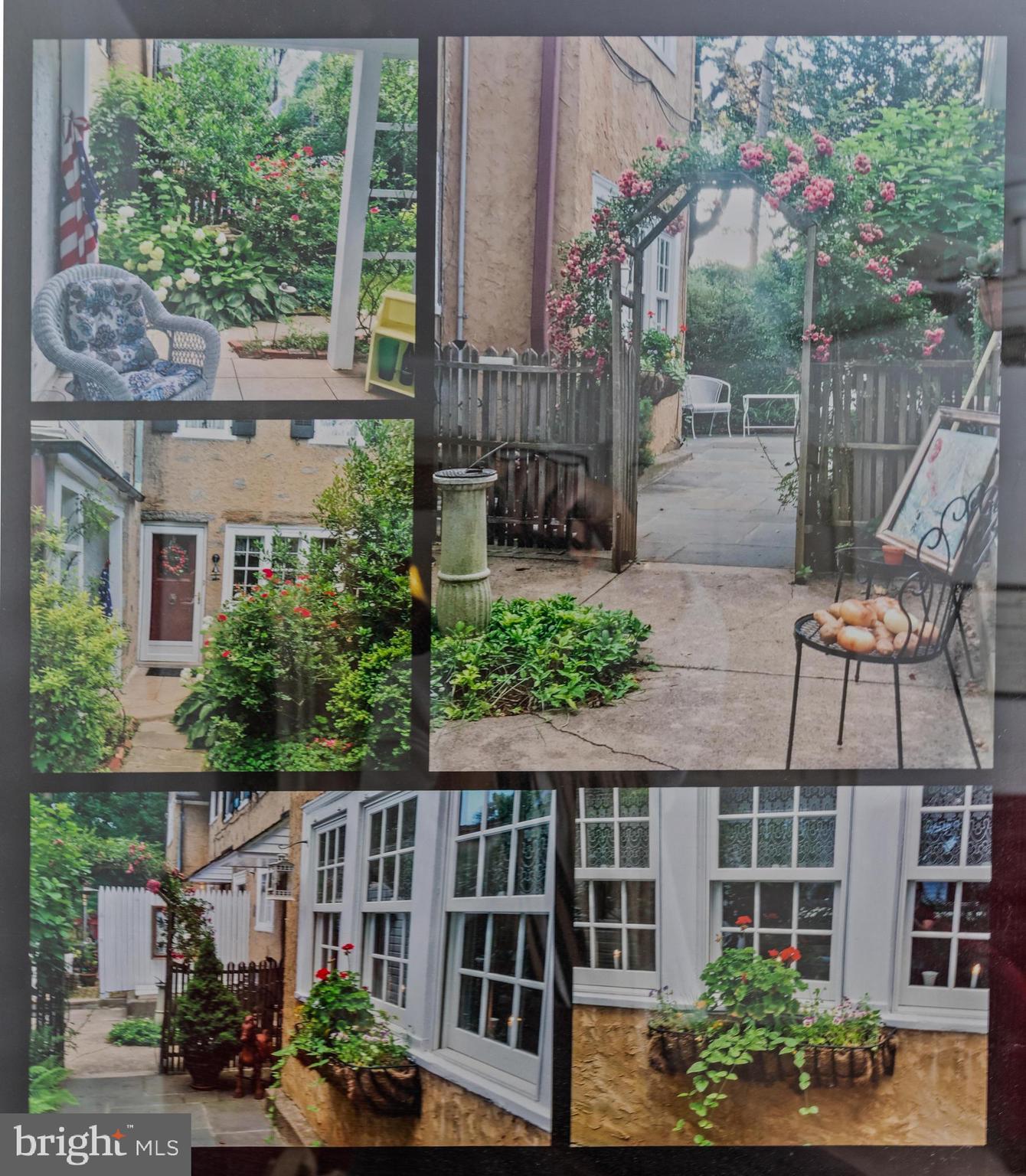 506 Spring Lane Wyndmoor, PA 19038 - Photo 29 of 29 a view of a house with a flower garden