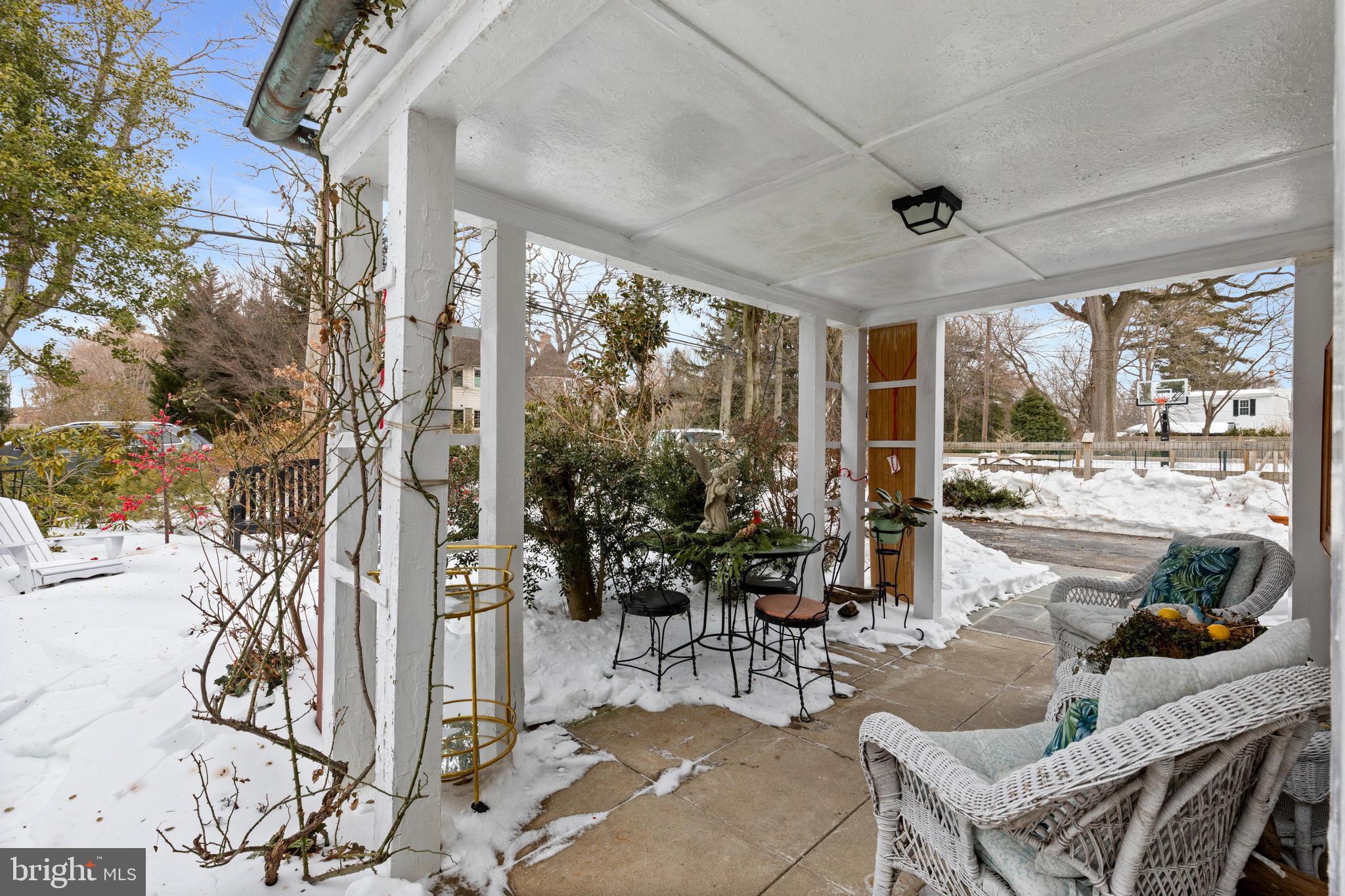 506 Spring Lane Wyndmoor, PA 19038 - Photo 6 of 29 a living room with furniture and a large window