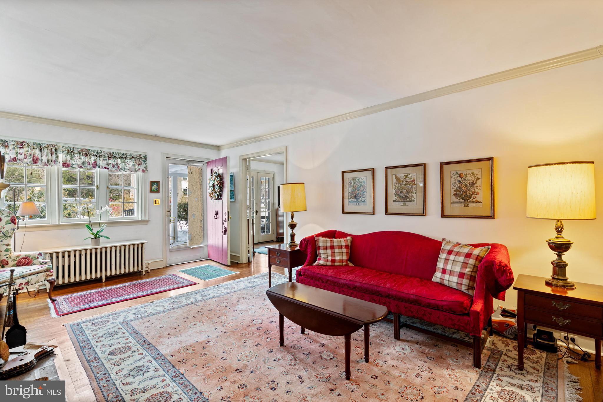 506 Spring Lane Wyndmoor, PA 19038 - Photo 7 of 29 a living room with furniture and a rug