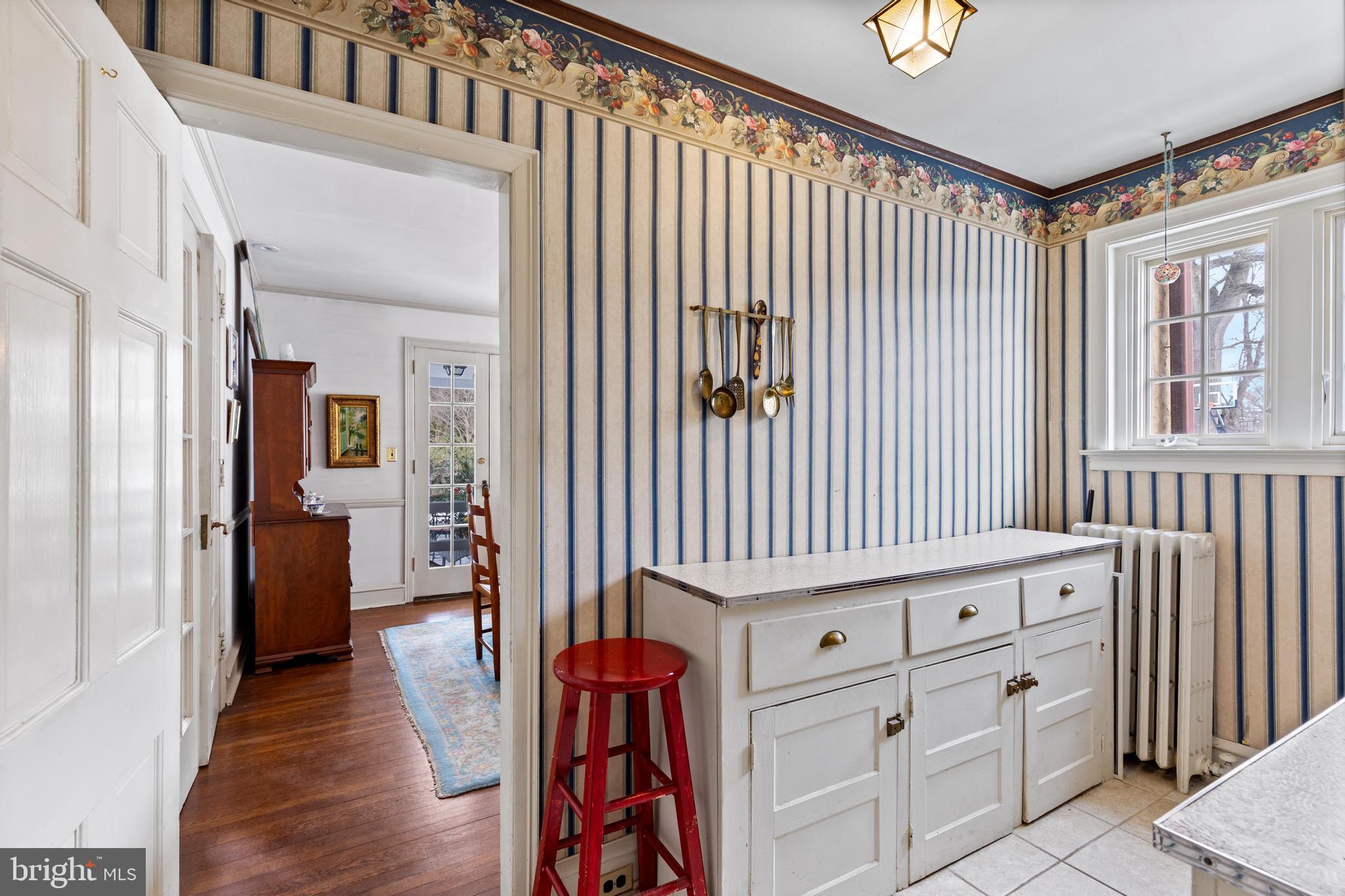 506 Spring Lane Wyndmoor, PA 19038 - Photo 10 of 29 a hallway with cabinets