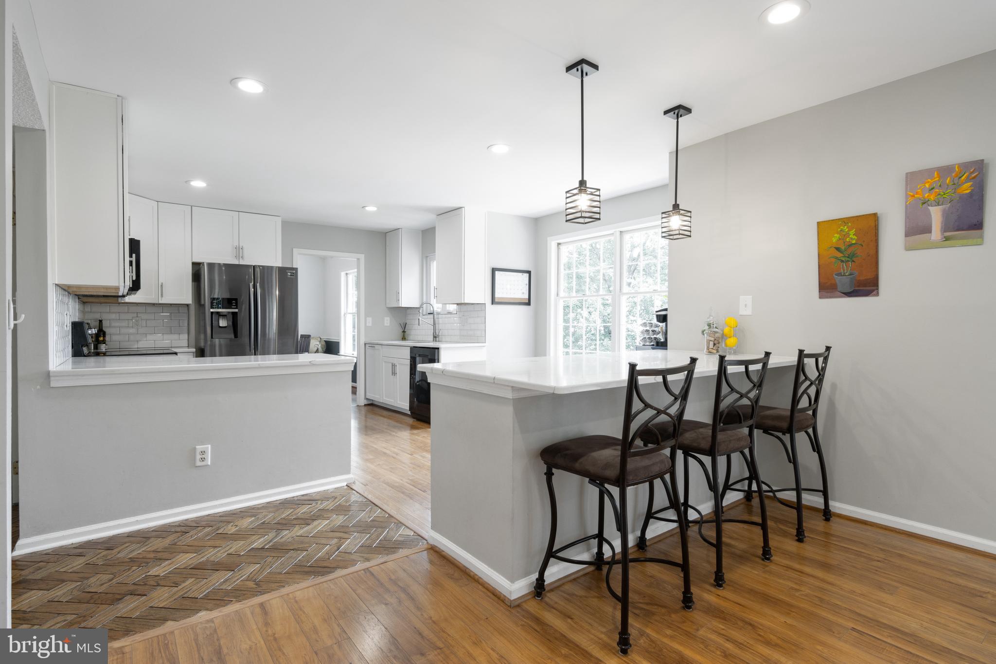 213 Hunters Ridge Road Lutherville-Timonium, MD 21093 - Photo 12 of 40 Quartz Counters on a Peninsula counter & Island