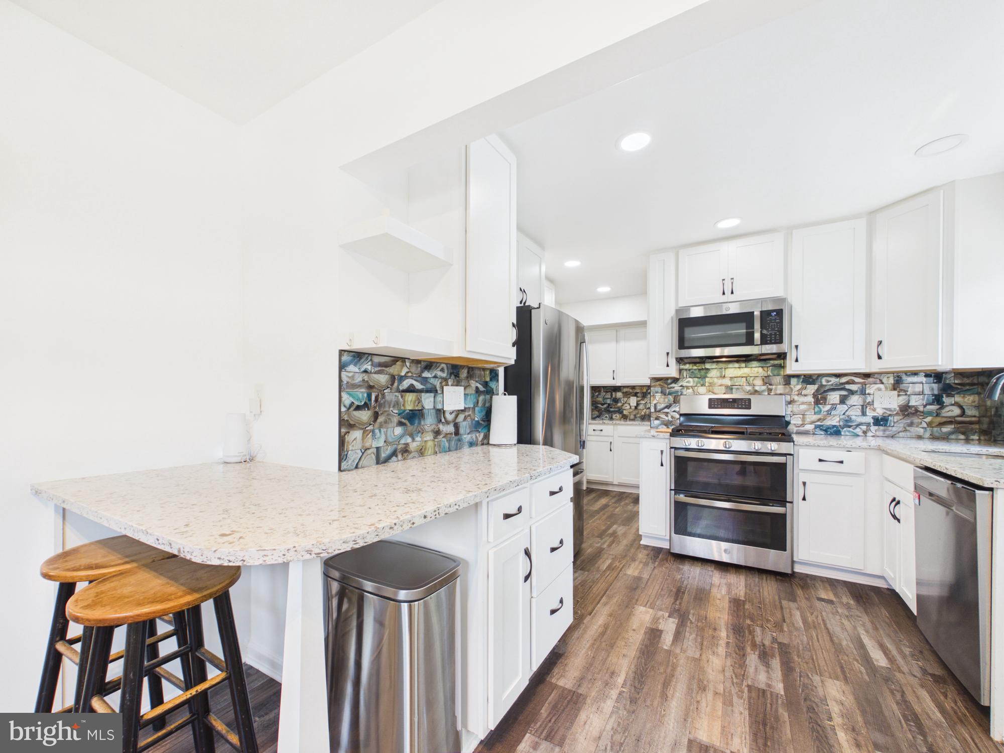 5512 Kathleen Place Springfield, VA 22151 - Photo 11 of 42 Modern kitchen with stylish finishes.
