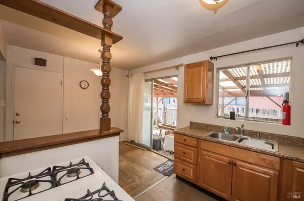 a spacious bathroom with a sink double vanity and a shower