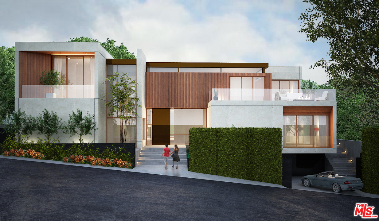 1410 Stradella Road Los Angeles, CA 90077 - Photo 1 of 24 a front view of a house with garden