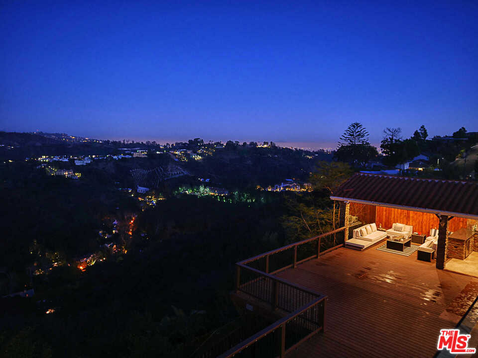 1410 Stradella Road Los Angeles, CA 90077 - Photo 14 of 24 a view of a balcony