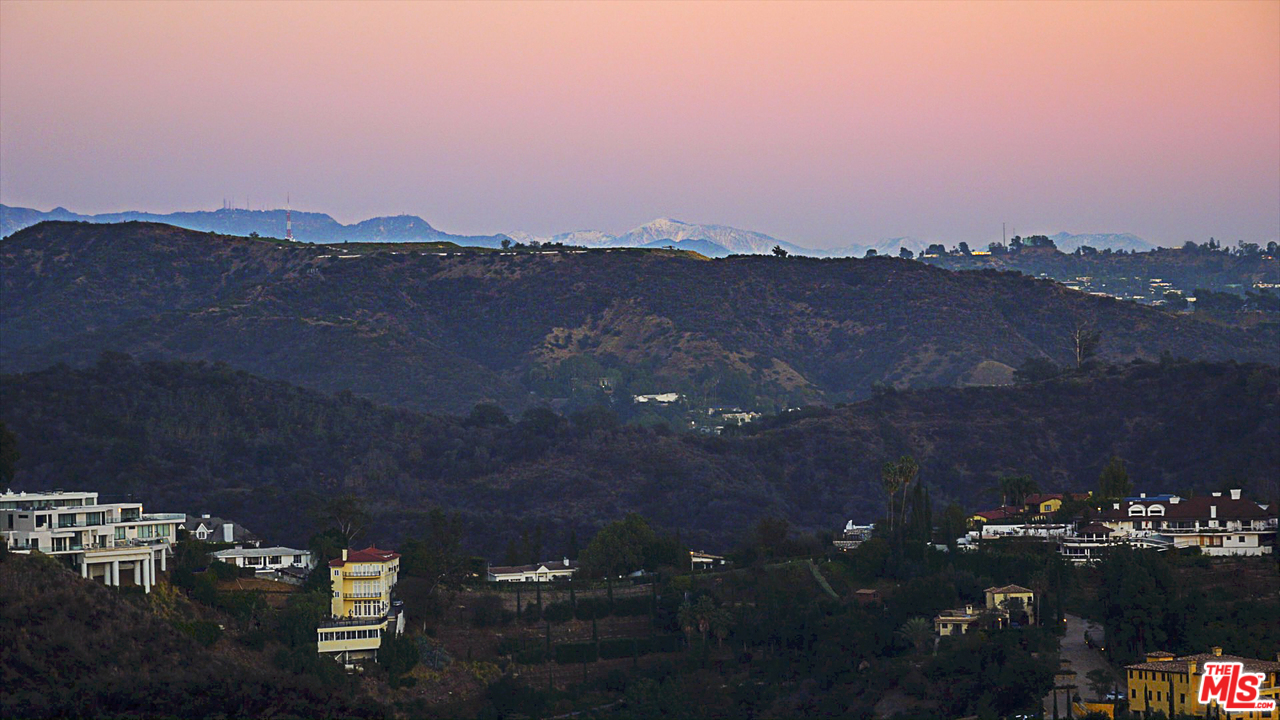 1410 Stradella Road Los Angeles, CA 90077 - Photo 20 of 24 a view of city and a mountain
