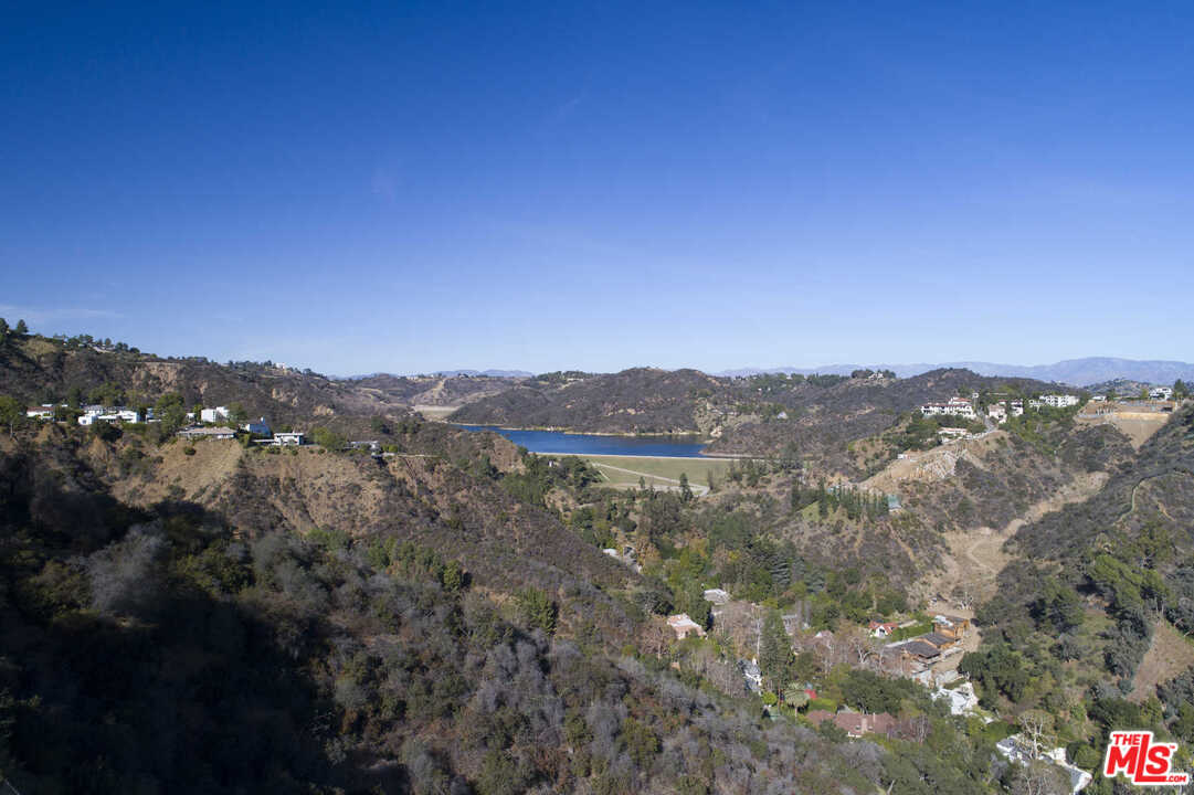 1410 Stradella Road Los Angeles, CA 90077 - Photo 24 of 24 a view of a city with lush green forest