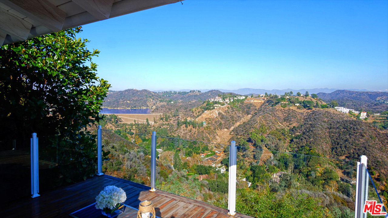 1410 Stradella Road Los Angeles, CA 90077 - Photo 5 of 24 a view of a city from a balcony