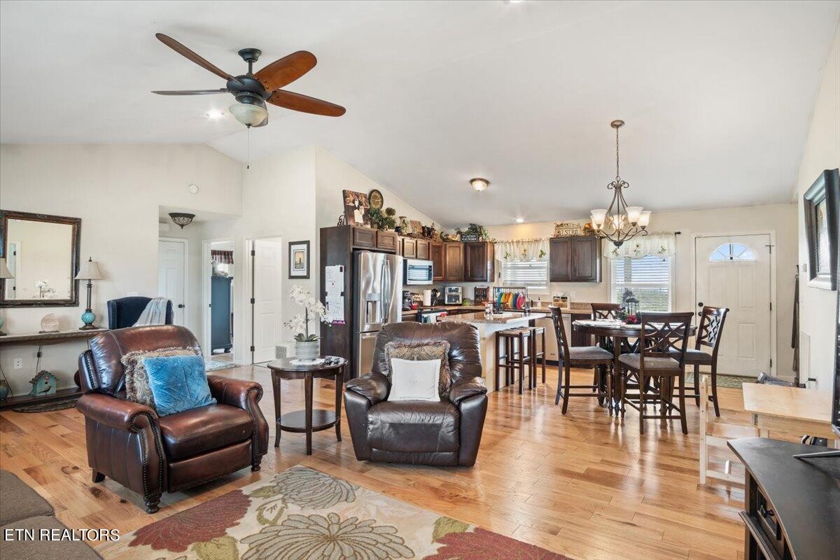 1935 Cozy Road Newport, TN 37821 - Photo 5 of 33 a living room with furniture kitchen view and a chandelier