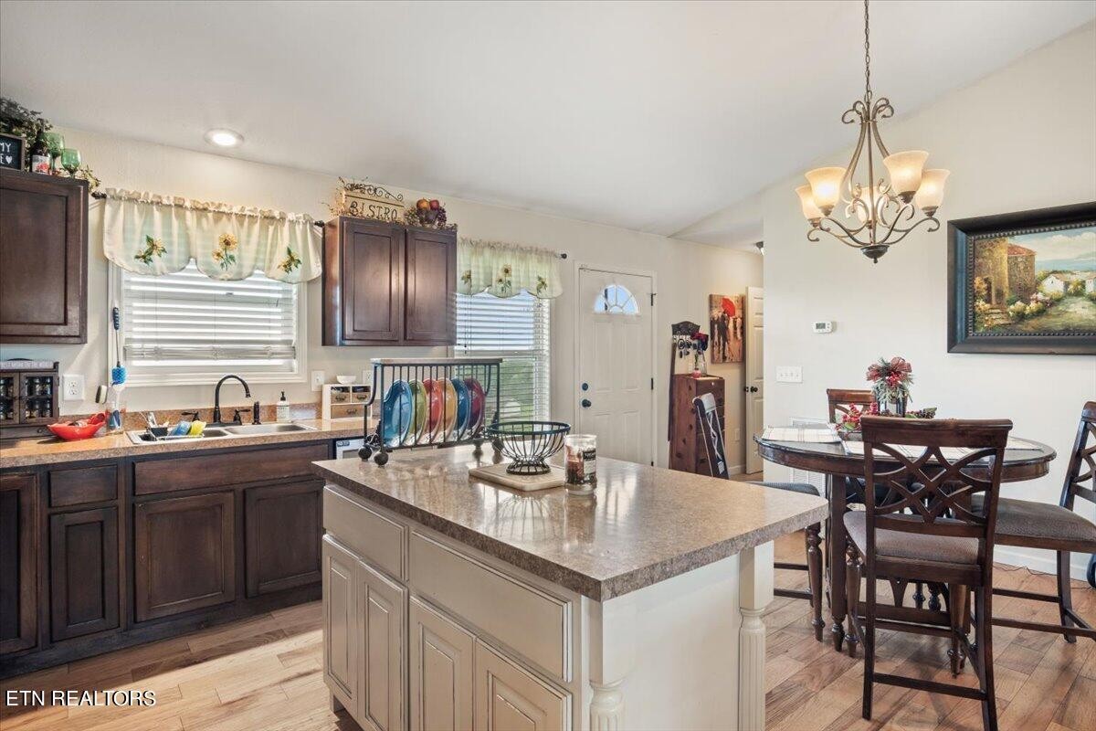 1935 Cozy Road Newport, TN 37821 - Photo 7 of 33 a kitchen with a table and chairs in it