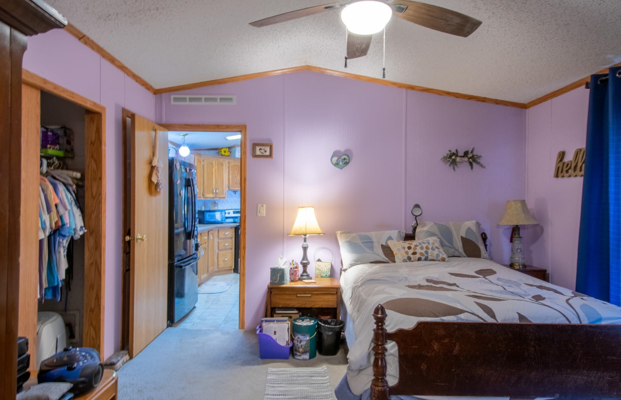 435 32 Road, Unit 437 Clifton, CO 81520 - Photo 17 of 29 a bedroom with a bed and a lamp
