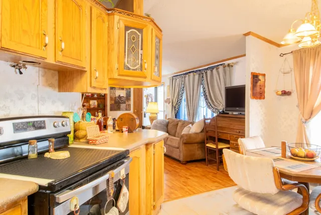 a view of a patio with table and chairs