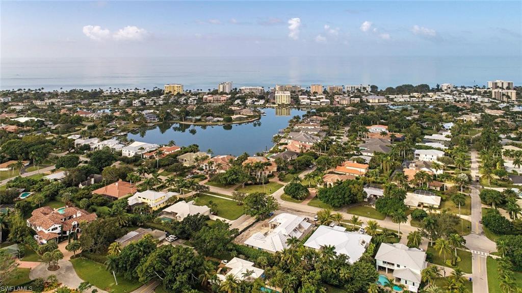 1880 Crayton Road Naples, FL 34102 - Photo 3 of 4 an aerial view of a city
